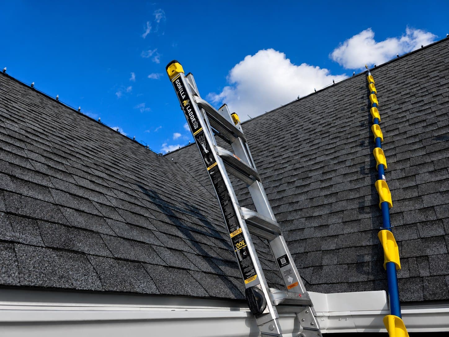 Extension ladder and roofline light installation tools on a Mount Joy, Pennsylvania home
